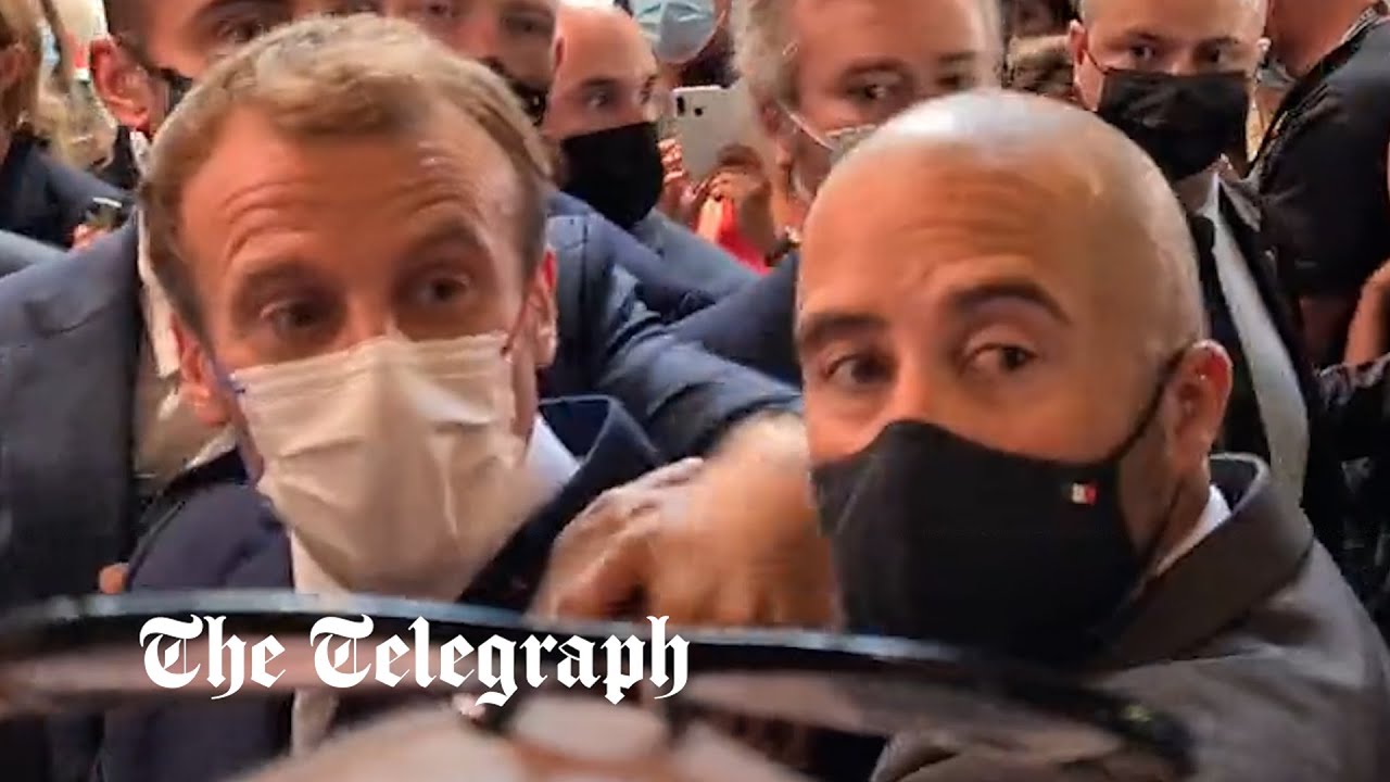 Emmanuel Macron pelted with egg by protester during restaurant fair