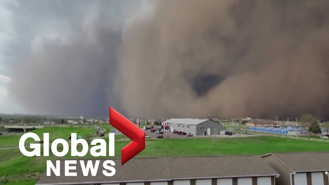 Dust storm darkens sky as it sweeps across South Dakota city The