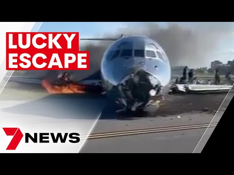 Passengers forced to make perilous evacuation after plane explodes in