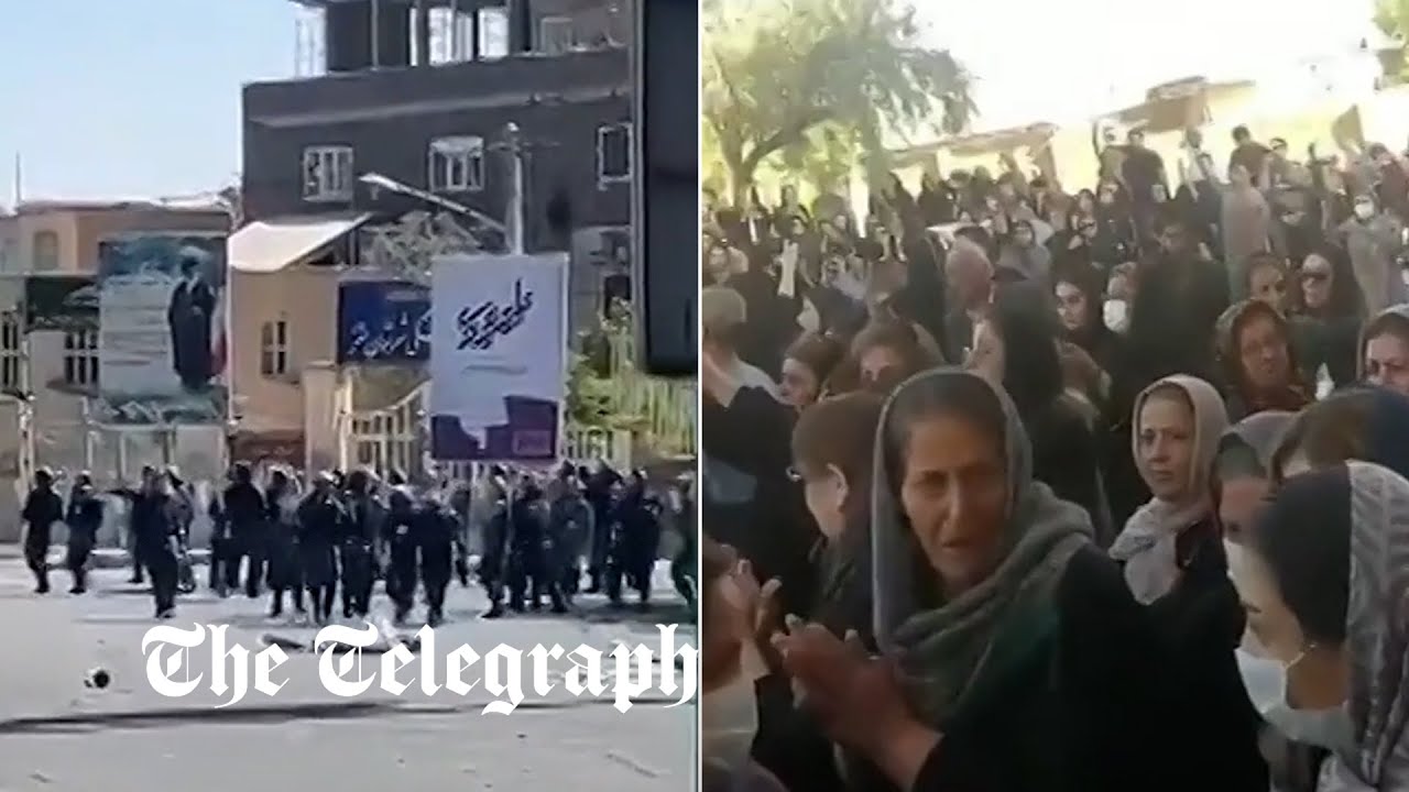 Iranian anti-riot unit attend funeral of a woman killed after being ...