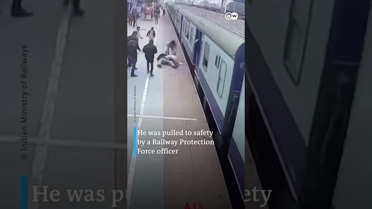India: Officer saves man from being run over by train | DW News - The ...