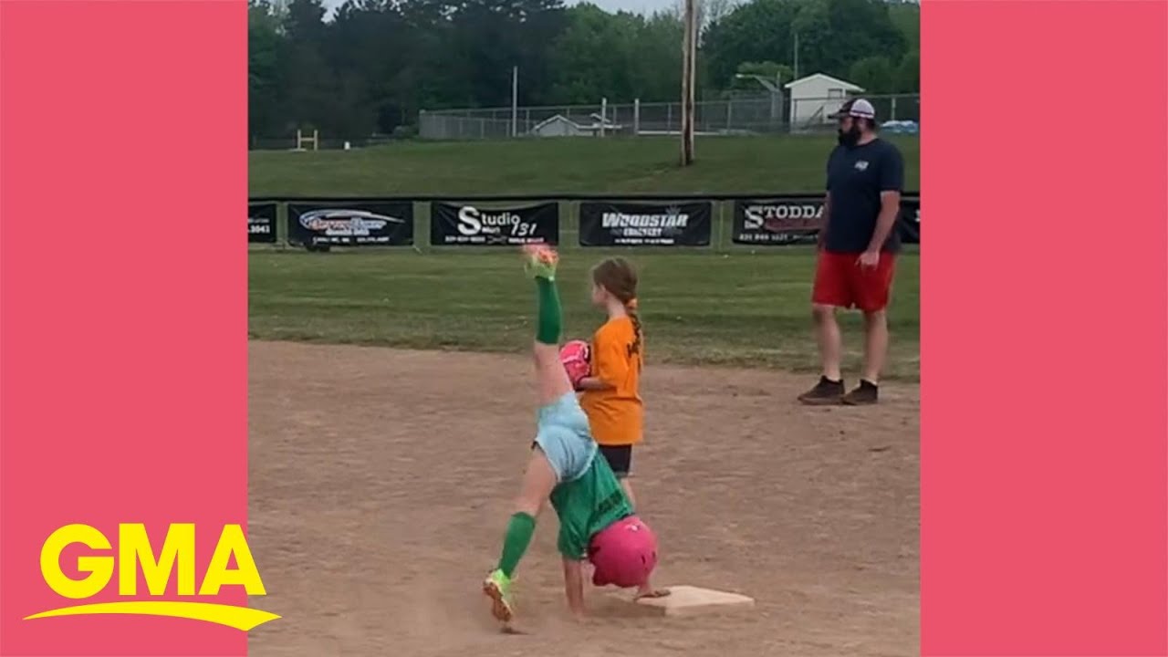 Watch this little girl cartwheel her way to first base during Tball