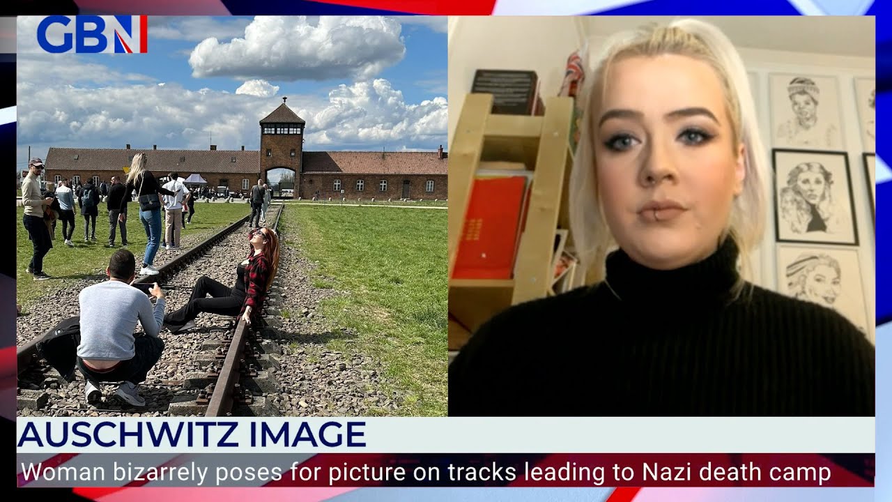 Social media-obsessed visitors pose for selfies on Auschwitz train