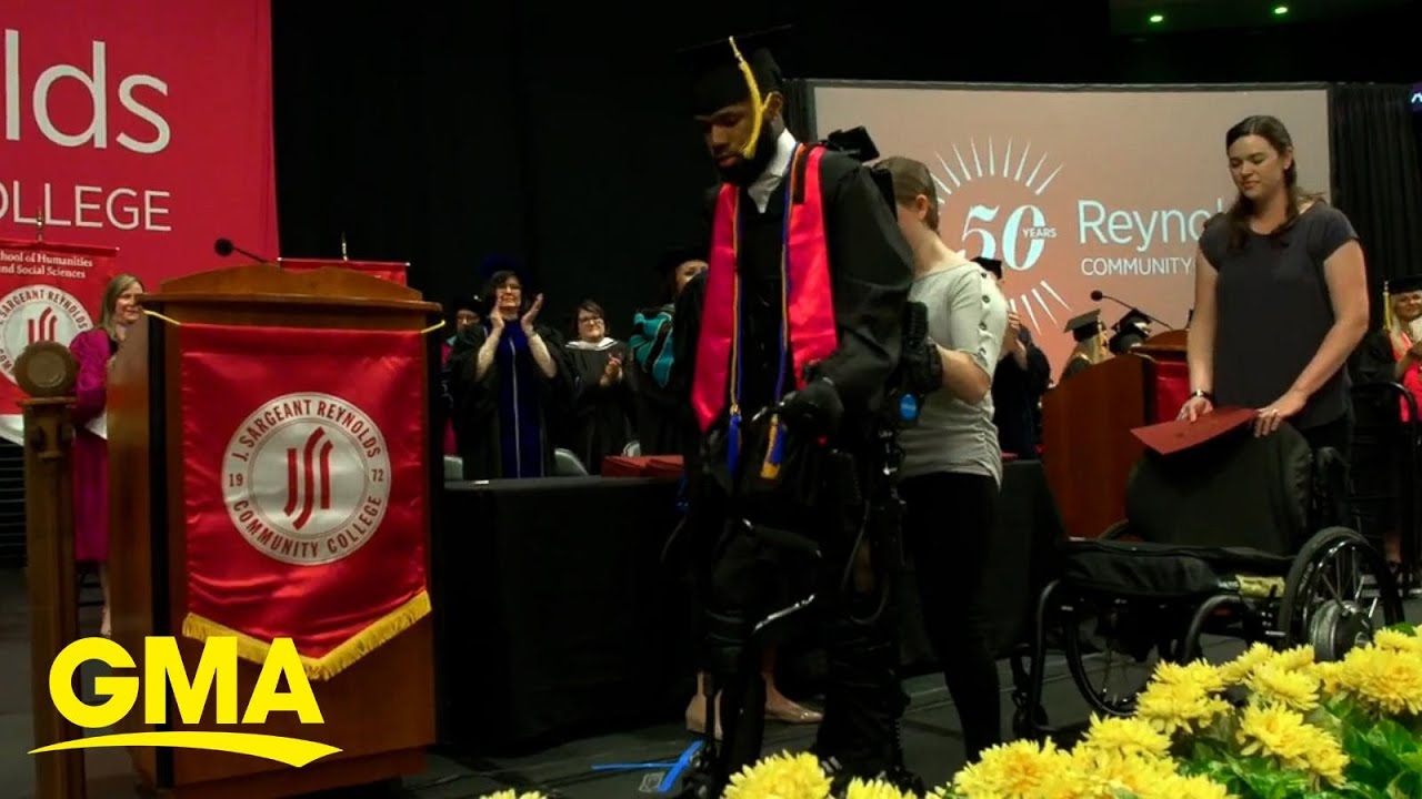 Watch moving moment paralyzed shooting victim walks across stage to ...