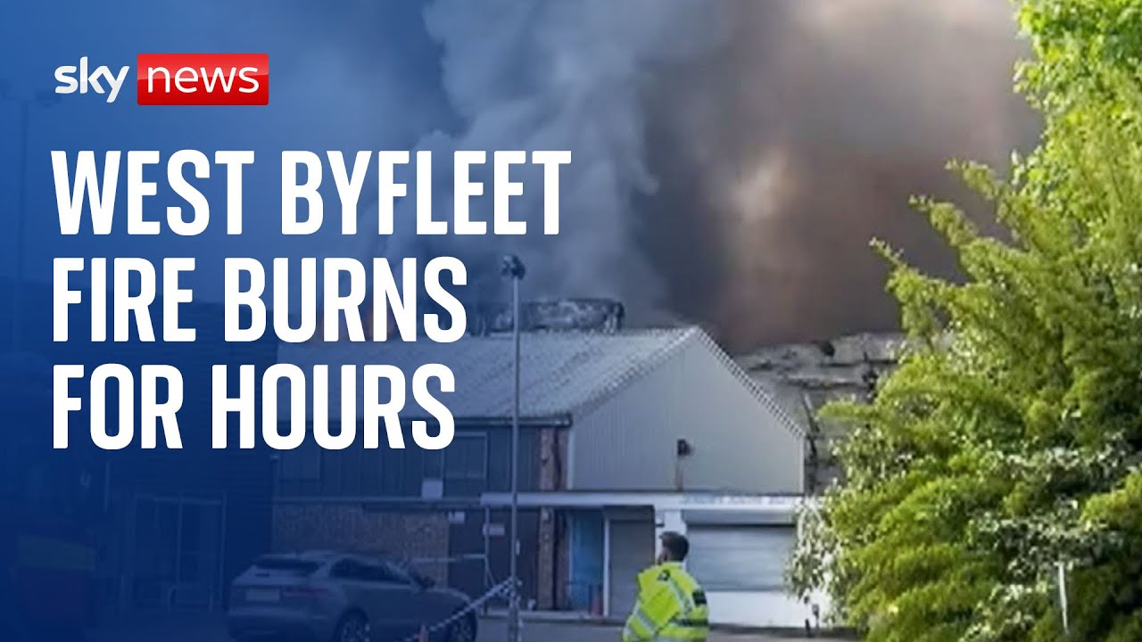 West Byfleet Firefighters struggle to put out a huge fire The Global