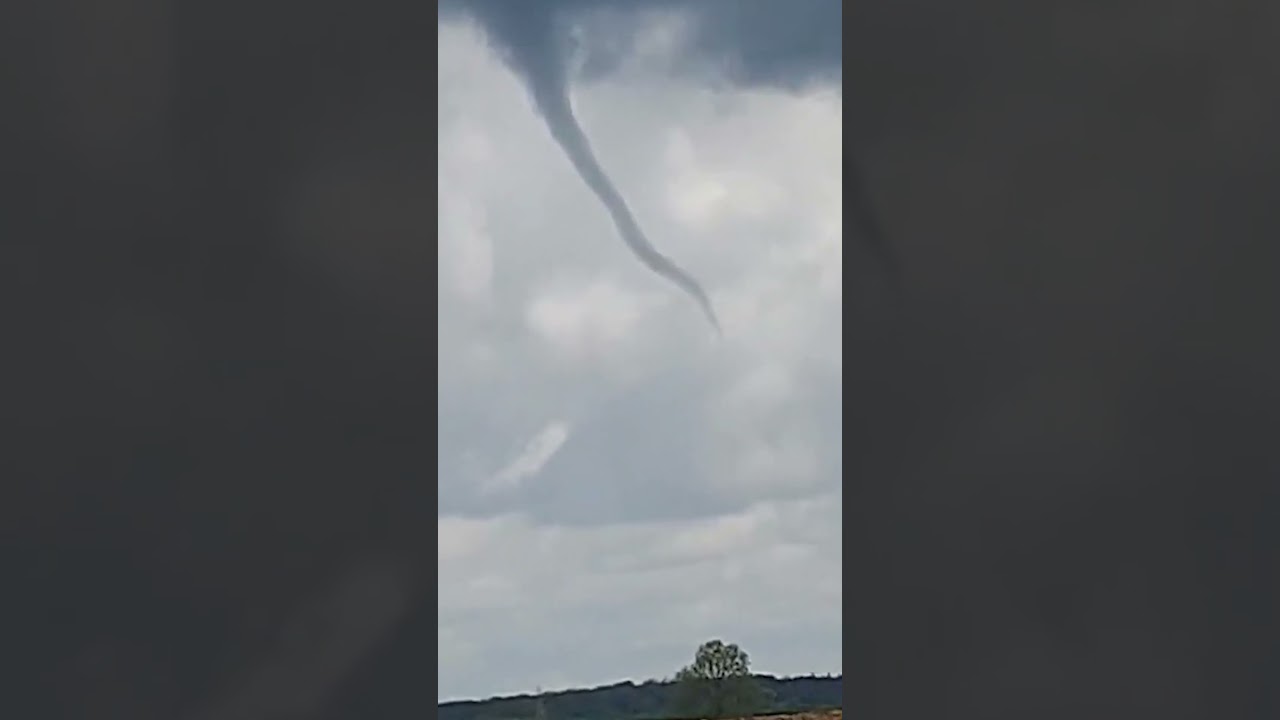Extreme weather as rare tornadoforming funnel cloud spotted in