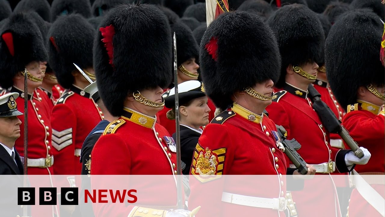 Troops perform Royal Salute in Buckingham Palace garden following King