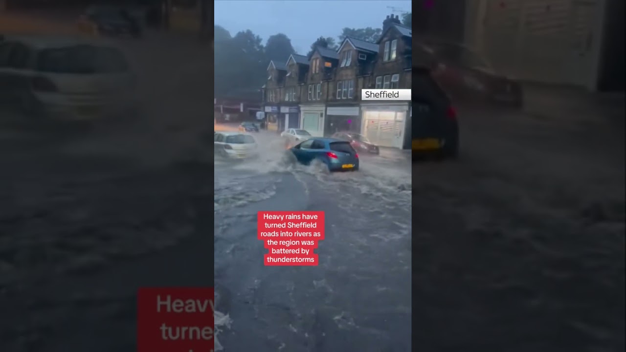 This video has captured cars ploughing through flooded roads in