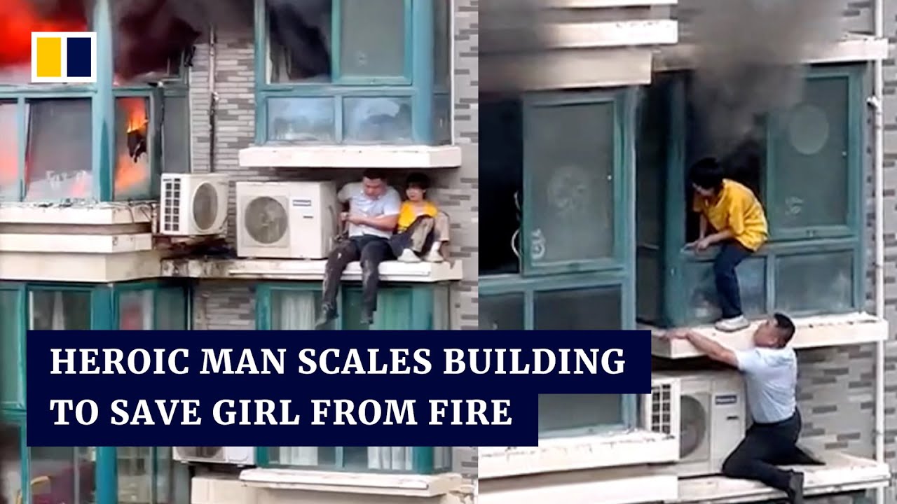 Heroic Chinese man scales building to save girl trapped in burning flat ...