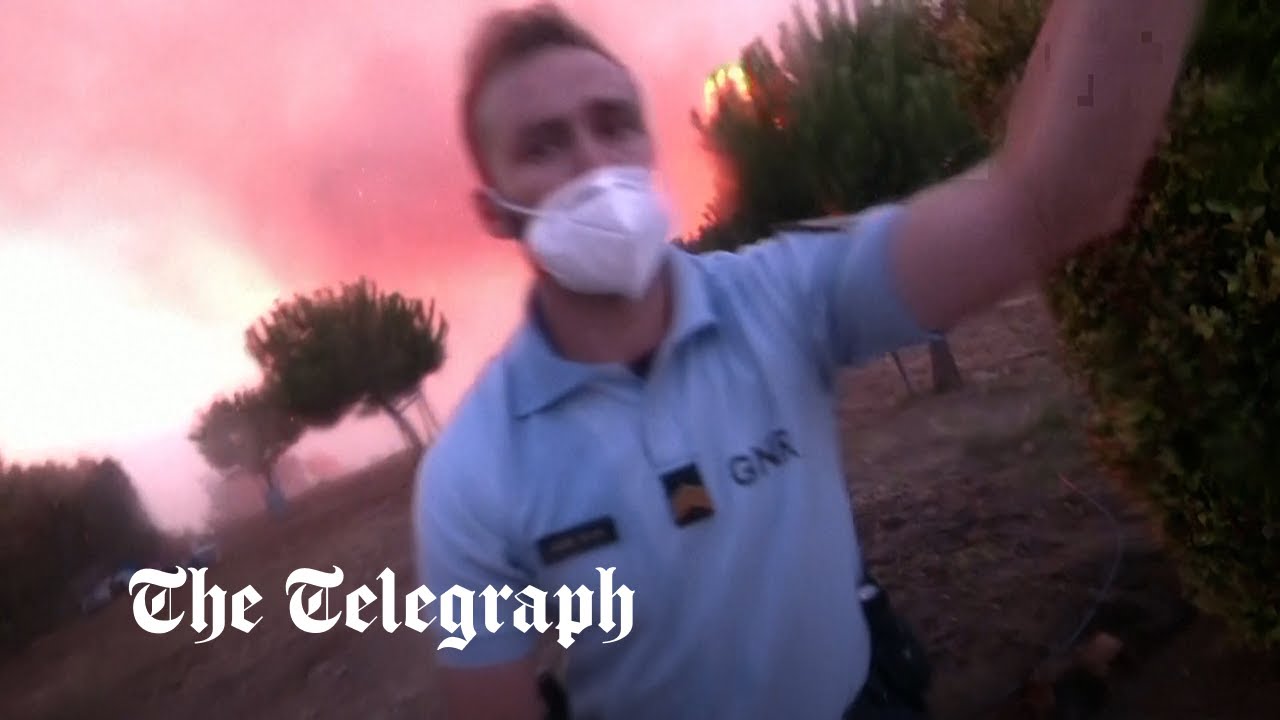 Portuguese firefighters retreat as they lose control of sweeping fire