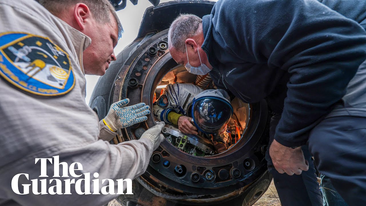 Astronaut and cosmonauts return to Earth after getting stuck in space ...